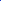 A close-up of Super Cheap Fabrics' Plain Mesh - Dazzling Blue (155cm) shows vivid blue polyester with a mesh-like texture, gently gathered into folds. It's lightweight and semi-sheer, ideal for clothing or decor.