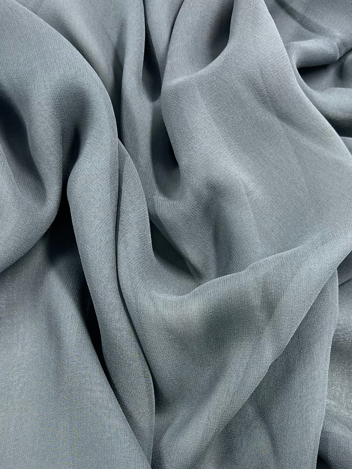 Close-up of our Pure Silk Georgette in Mercury from Super Cheap Fabrics, showcasing its soft, flowing texture and gentle folds—ideal for creating spring outfits. Width: 135cm.