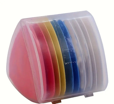 A six-piece set of colorful CD cases in a semi-circular, transparent plastic holder, resembling vibrant sewing supplies in pink, red, yellow, green, blue, and clear shades.