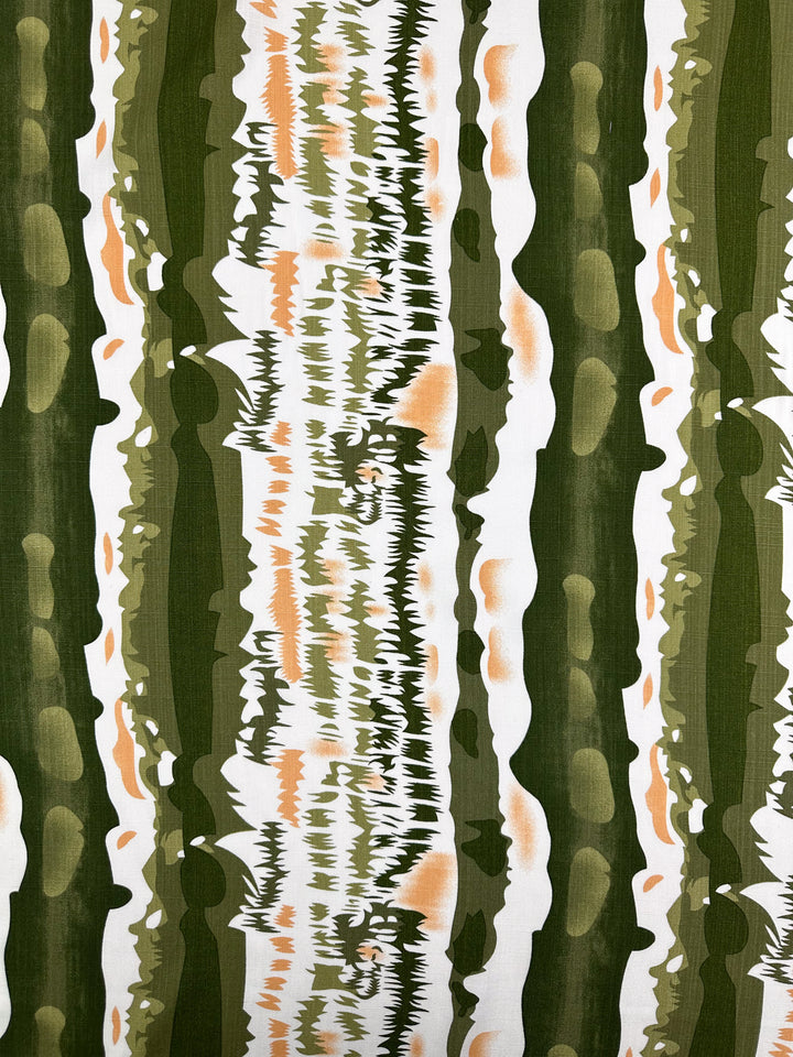 Bamboo Rayon - Torn Camo by Super Cheap Fabrics features abstract vertical green, white, and orange stripes with jagged watercolor edges. This 150cm lightweight fabric is perfect for beginner sewing projects.