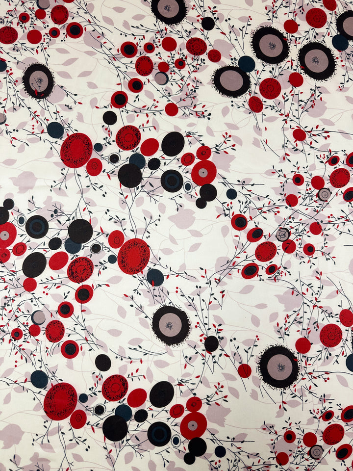 The Silky Satin - Dried Flower from Super Cheap Fabrics features a white backdrop with red, black, and gray circles linked by thin lines, dotted patterns, and leaf-like shapes for an elegant satin-like aesthetic.