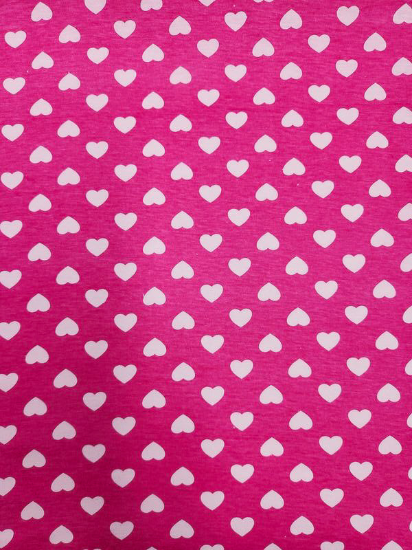 The medium-weight Printed Jersey - Hearts by Super Cheap Fabrics features a bright pink background with evenly spaced white hearts, ideal for cheerful projects. Width: 160cm.