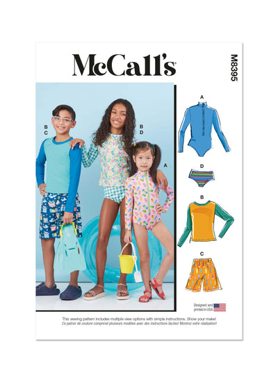 A group of children, wearing outfits made from lightweight denim and cotton duck canvas using the Mccall's M8395 pattern featuring rash guard bodysuits, tops, shorts, and bikinis by Super Cheap Fabrics, pose cheerfully for a picture.