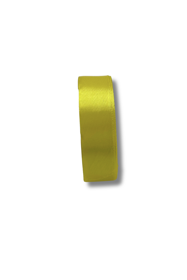 A spool of Super Cheap Fabrics Satin Ribbon - 16 Colours - 25mm stands upright against a white background, casting a soft shadow to the right.