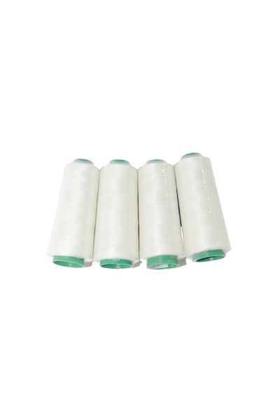 Four spools from the "4 Pack Overlocking Thread - Natural" by Super Cheap Fabrics, each with green caps, are aligned horizontally on a white background. This pack of high-quality spools features smooth, tightly wound thread with a total length of 2000 metres.