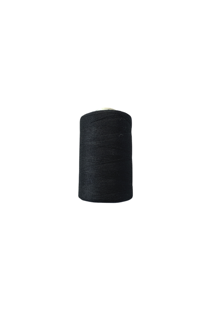 A small spool of Super Cheap Fabrics' Thread - Black stands vertically against a plain white background. This spun polyester thread, tightly wound around the spool, measures an impressive 1000 meters.