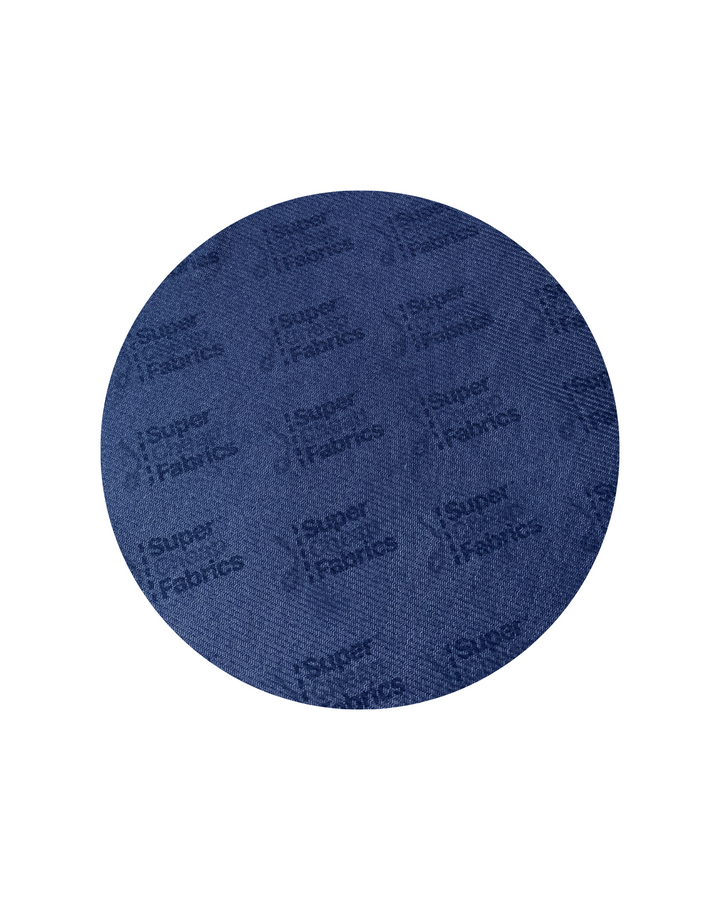 A close-up image of a circular fabric swatch in navy blue, featuring the repeated text "Super Cheap Fabrics" printed throughout in a slightly darker shade of blue. The texture of this lightweight Plain Mesh - Navy - 160cm fabric is visibly detailed.